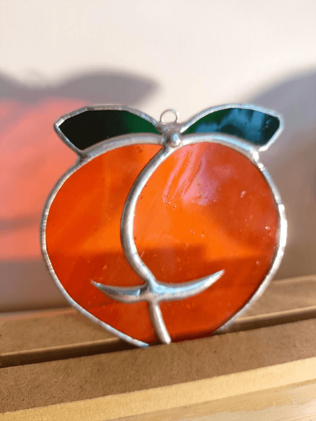 Boule de pêche orange 