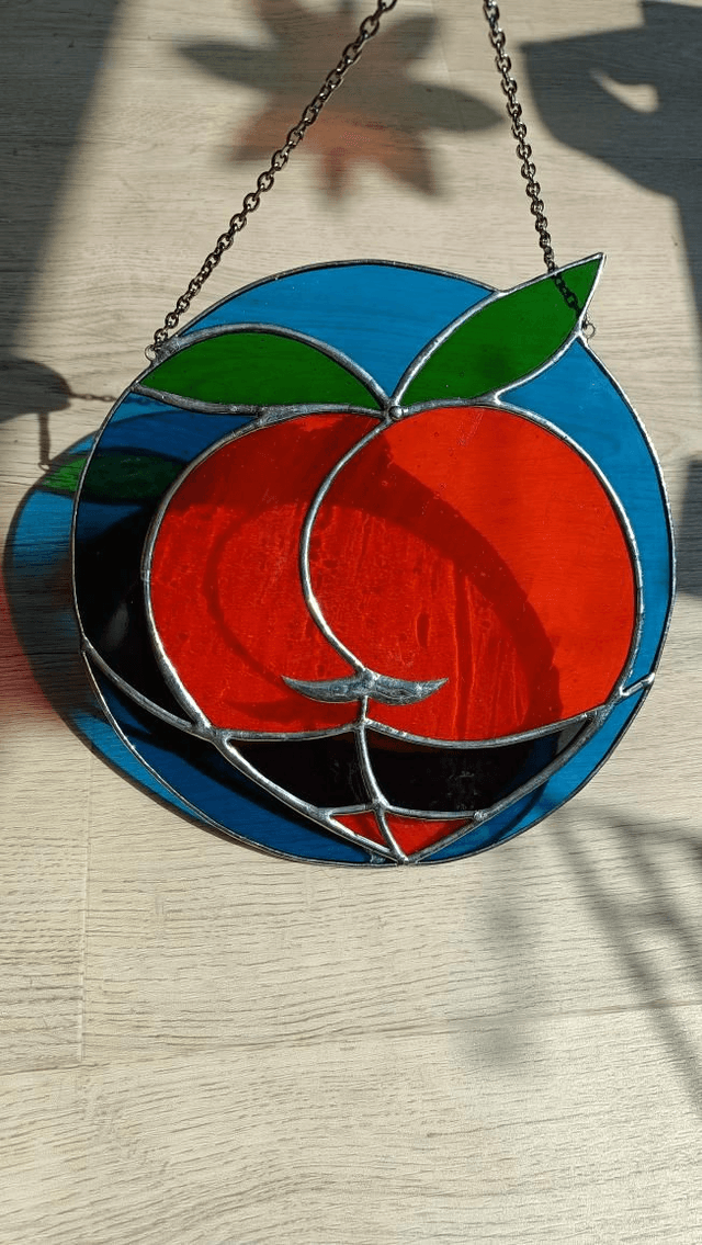 Big boule de pêche orange et bleu
