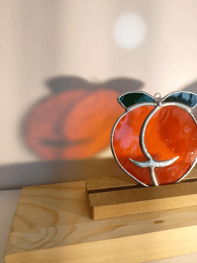 Boule de pêche orange 
