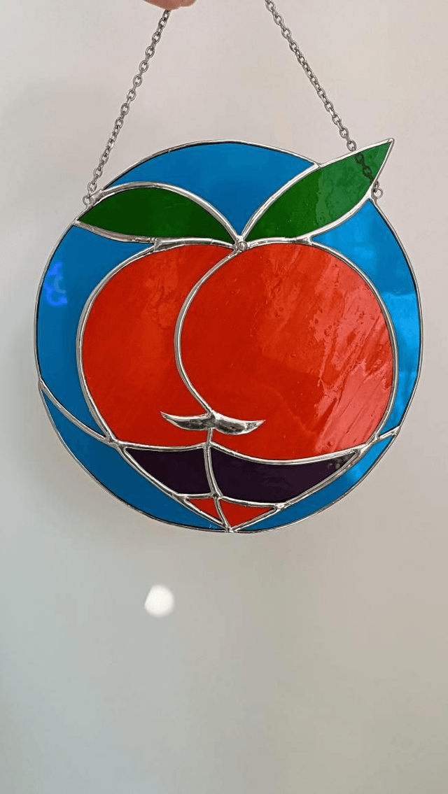 Big boule de pêche orange et bleu