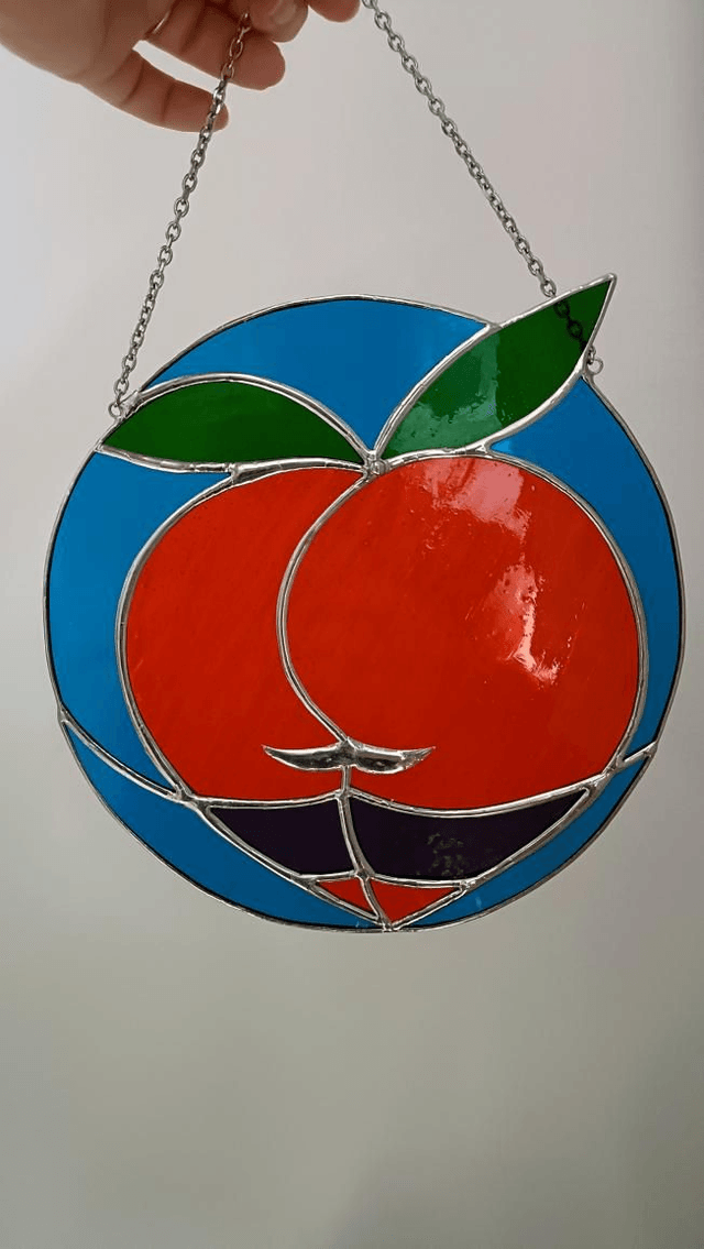 Big boule de pêche orange et bleu