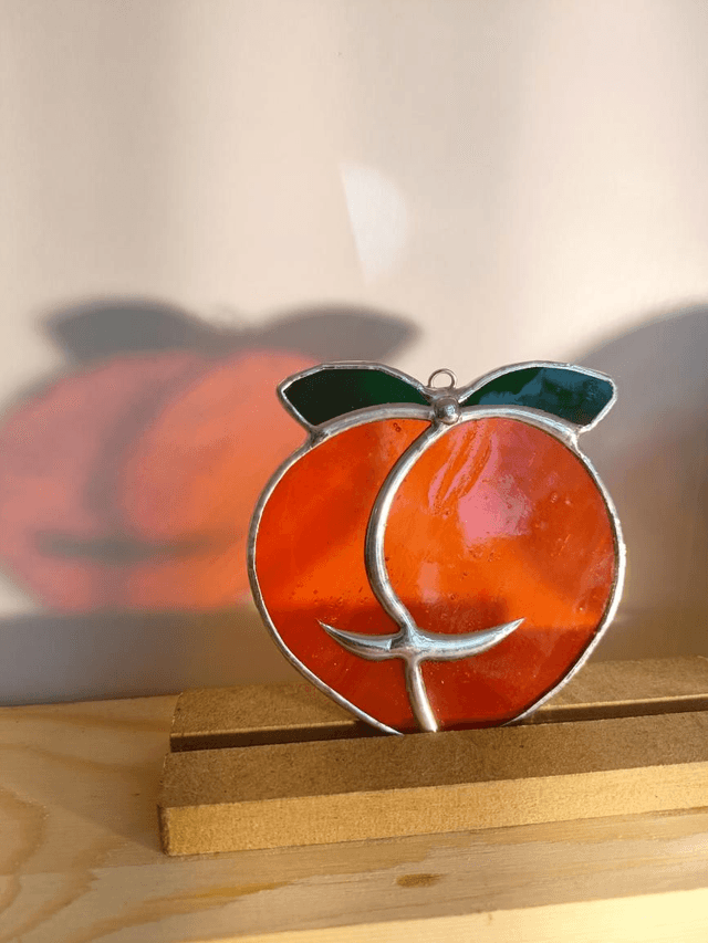 Boule de pêche orange 